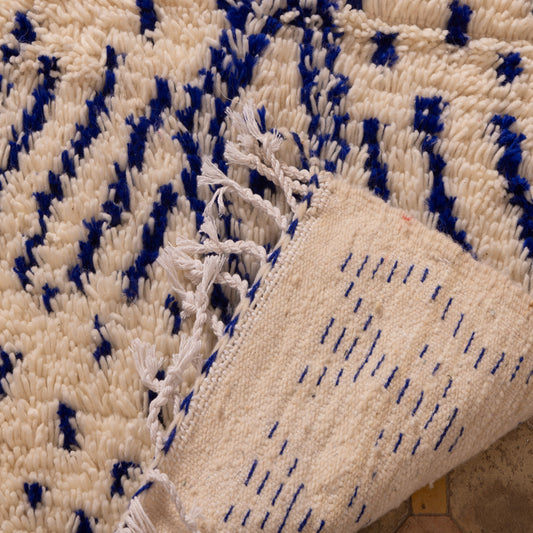 andwoven Moroccan Wool Rug - Intricate Blue Tribal Patterns on Cream - Soft & Durable