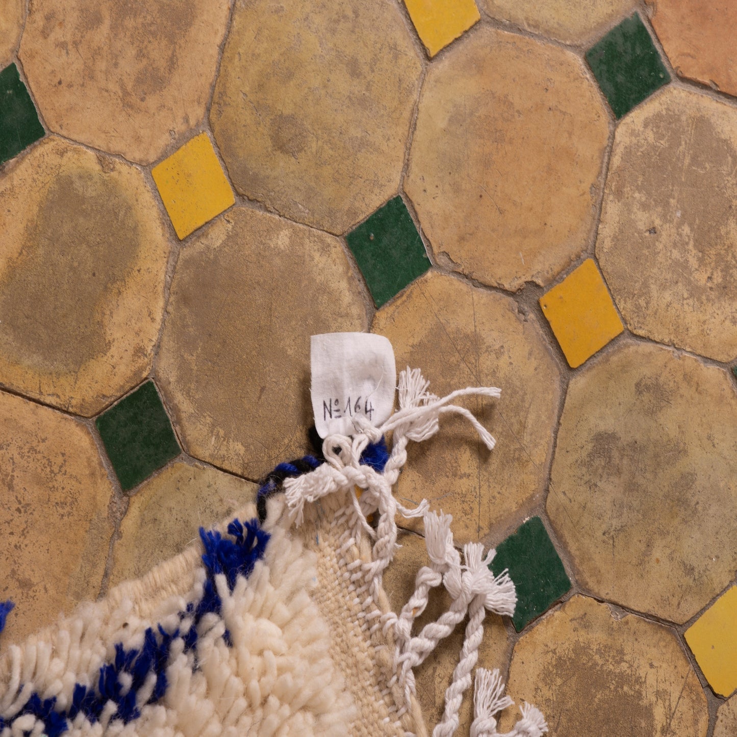 andwoven Moroccan Wool Rug - Intricate Blue Tribal Patterns on Cream - Soft & Durable