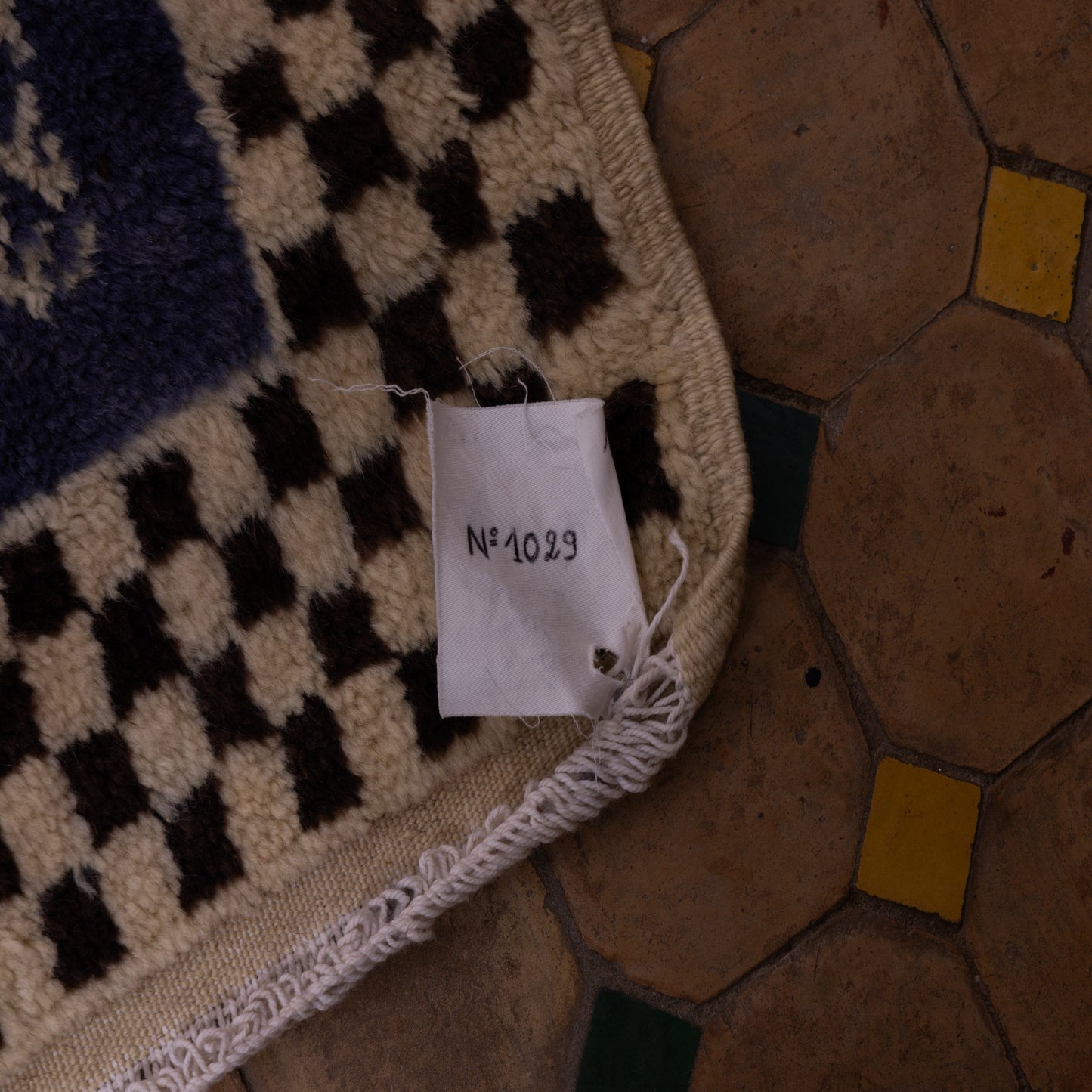 Handwoven Taznakht Moroccan Rug – 100% Wool Black & Beige Checkerboard with Intricate Blue Geometric Panels – Authentic Berber Craftsmanship ; 8,86 ft / 5,25 ft