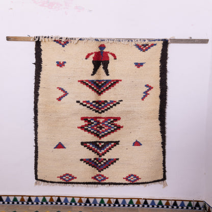 Vintage Azilal Moroccan Rug with Tribal Human Figure - Handwoven Wool Berber Carpet – Boho Folk Art Wall Hanging