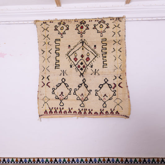Nomadic Symbols” – Vintage Moroccan Rug with Tribal Motifs and Minimalist Palette