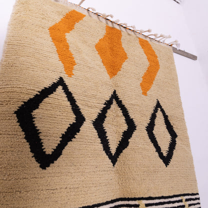 Minimalist Berber Boujad Rug – New Moroccan Wool Rug – Beige with Black Diamonds & Orange Tribal Motifs – Modern Boho Wall Hanging