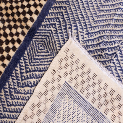 Handwoven Taznakht Moroccan Rug – 100% Wool Black & Beige Checkerboard with Intricate Blue Geometric Panels – Authentic Berber Craftsmanship ; 8,86 ft / 5,25 ft