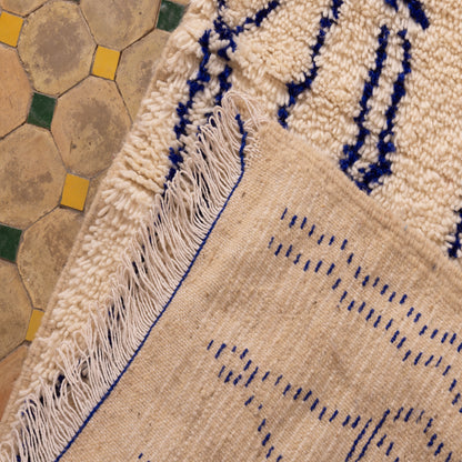 Handwoven Moroccan Wool Rug - Blue Tribal Geometric Patterns on Cream Base - Artisan Crafted